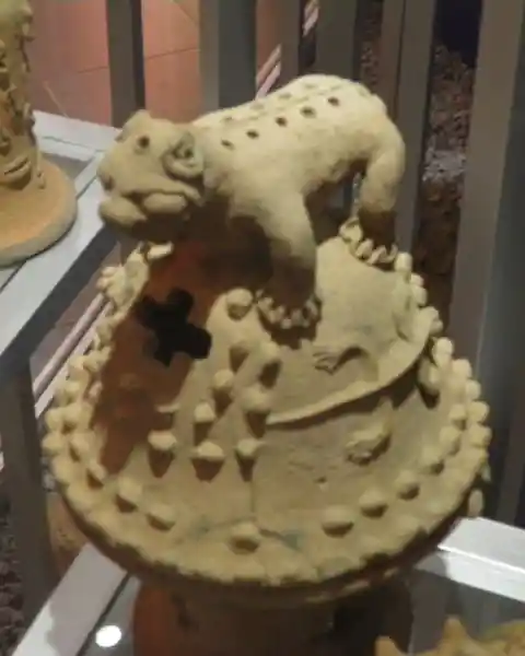 Ritual item, solar disc with an animal on top